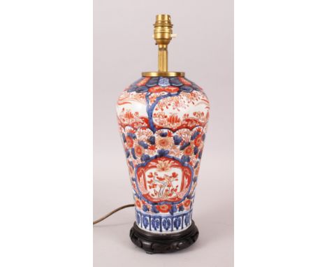 A JAPANESE MEIJI PERIOD IMARI PORCELAIN VASE CONVERTED TO LAMP, the vase decorated in typical imari blue &amp; orange palette