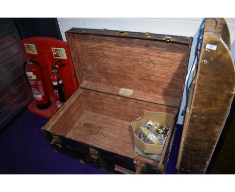 A vintage American ply line steel bound travel trunk, dimensions approx. 92 x 33 x 41cm. Containing a small quantity of elect