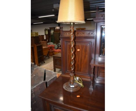 An early 20th Century oak open twist table lamp, height approx. 60cm to fitting