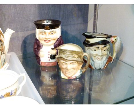 Three ceramic character jugs including Royal Doulton