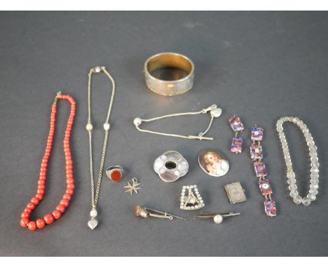 A collection of Victorian and early 20th century jewellery, including a Scottish Celtic design white metal (tests as silver) 