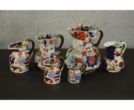 A collection of 19th century six graduated Masons Ironstone Oriental design ceramic jugs. H.25 Dia.29cm. (largest) 