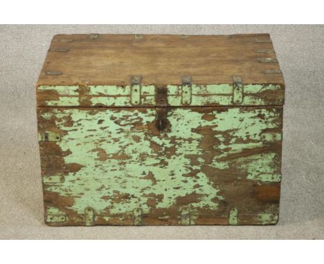 A 19th century Indian green painted camphor wood trunk, iron bound and of rectangular form. H.48 W.73 D.50cm. 