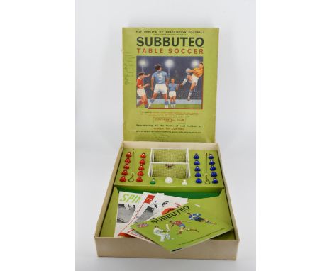 A vintage Subbuteo table football set with box and acrylic pieces. (complete). 