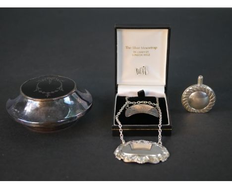 A collection of silver items, including two silver drinks labels, a Victorian silver and tortoiseshell trinket box and a silv
