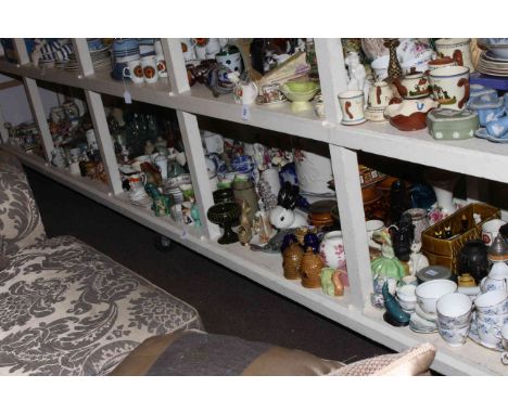 Full shelf of china, glass, ornaments, glass and stoneware bottles, teawares, etc.