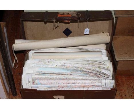 Suitcase of UK vintage and modern ordnance survey maps.