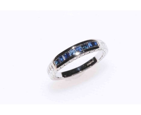 Sapphire square cut eight stone ring set in 9 carat white gold, size O.