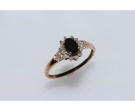 9 carat gold, sapphire and diamond ring, size O.