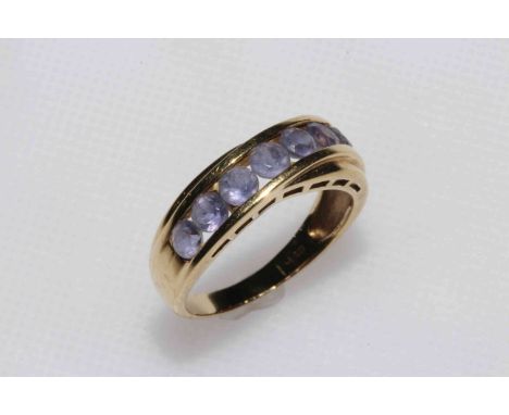 14 carat yellow gold and amethyst row ring, size P.