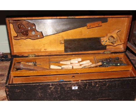 Carpenters tool chest with tools, 81cm by 28cm by 26cm.