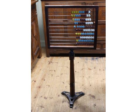 Vintage abacus on pitch pine and cast triform base bearing label The North of England School Furnishings, Darlington.