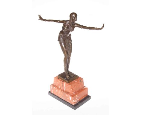 Art Deco bronze lady figure in a dancing pose on marble plinth, 56cm high.