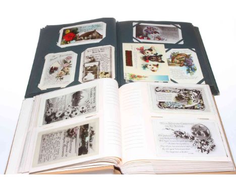 Two postcard albums housing vintage birthday greetings postcards, approximately 340 cards.