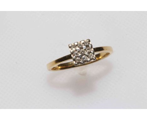 18 carat gold and nine stone diamond ring, size M/N.