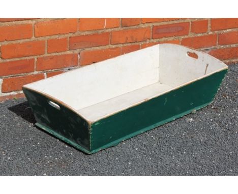 A PAINTED PINE RECTANGULAR TROUGH with pierced handles. 