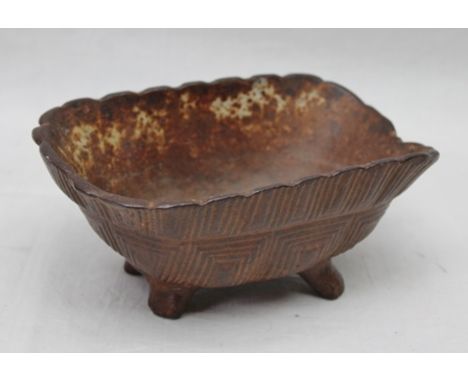 A 19TH CENTURY CAST IRON LIGHTING FAT RECEPTACLE of upturned carapace design, 19.5cm x 13.5cm 