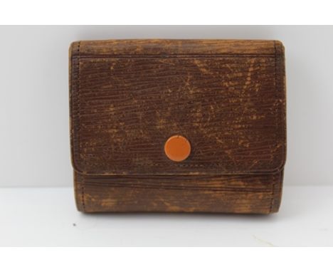 A FIRST QUARTER 20TH CENTURY BURROUGHS WELLCOME &amp; CO "TABLOID" BRANDED FIRST AID FIELD SYRINGE KIT in an embossed leather