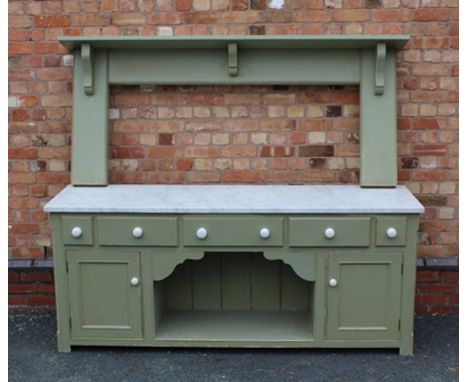 A VICTORIAN DESIGN GREEN PAINTED PINE DRESSER BASE, with three drawers flanked by two box drawers with white ceramic knob han