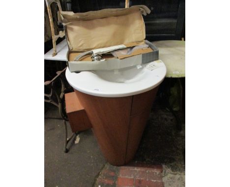 Philippe Starck, modern circular ceramic and wooden effect free standing basin with taps