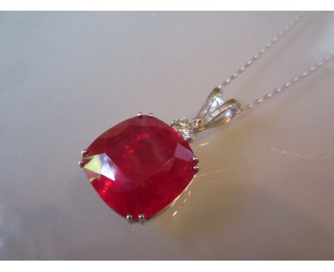 Large 18ct white gold pendant set treated cushion cut ruby on an 18ct white gold chain CONDITION REPORT This is a new item. M