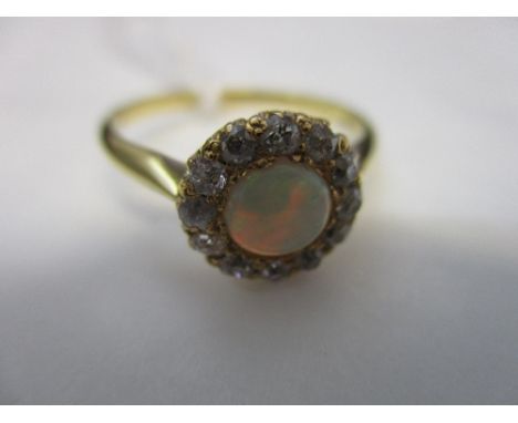 18ct Yellow gold opal and diamond flower head ring