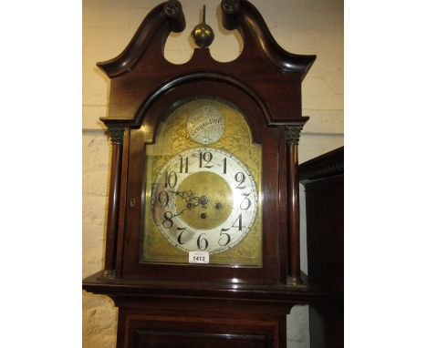 Edwardian mahogany longcase clock, the engraved brass arch top dial having silvered chapter ring with Arabic numerals and thr