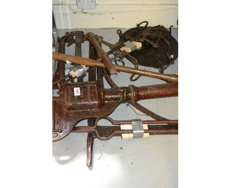 Large pair of cast iron and brass weighing scales (lacking base), an 18th Century pot hanger, fire tongs, scythe and an iron 