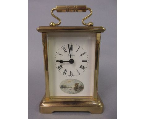 Modern brass cased carriage clock, the enamel dial with Roman numerals, signed Dominion with a single train movement