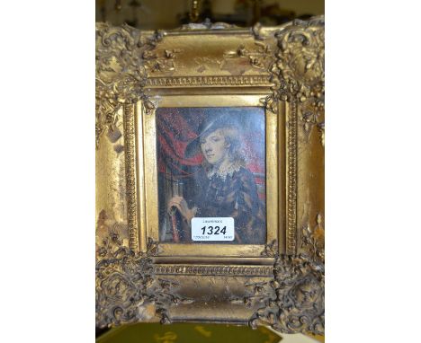Watercolour on print base, miniature portrait of a boy holding a book, housed in an ornate gilt frame