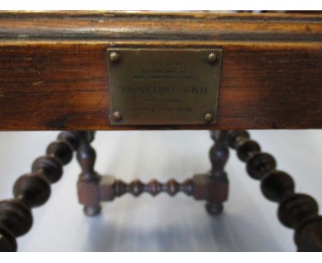Rectangular oak stool on bobbin turned supports with brass plaque for H.M.S. Britannia, cadet training ship at Dartmouth, 186