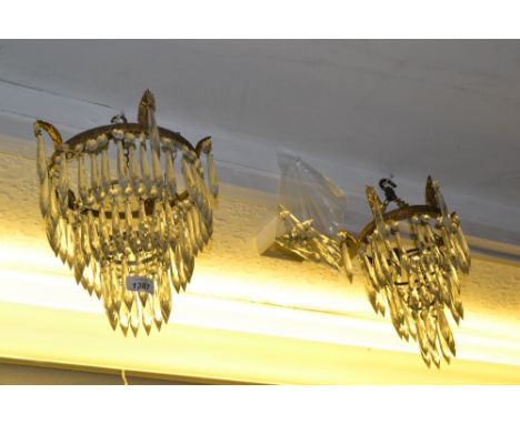 Small gilt brass and glass circular three tier light fitting together with another similar