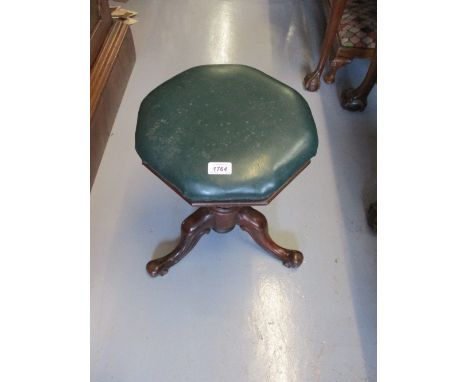 Victorian octagonal swivel seat piano stool on a carved walnut tripod base