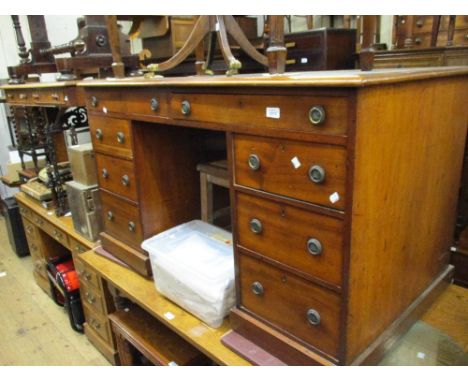 19th Century mahogany twin pedestal desk, the inset top above eight drawers with brass ring handles and plinth base CONDITION