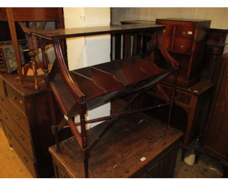 Reproduction mahogany book table, the moulded top above a divided shelf, turned supports and crossover stretchers