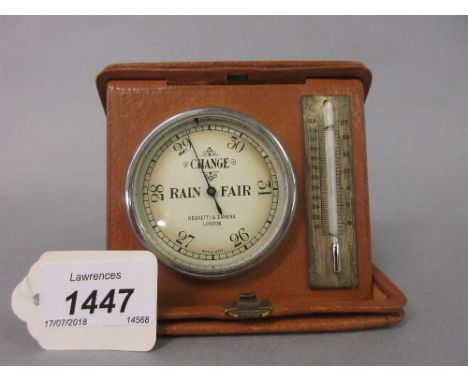 Negretti and Zambra travel barometer / thermometer in a leather case