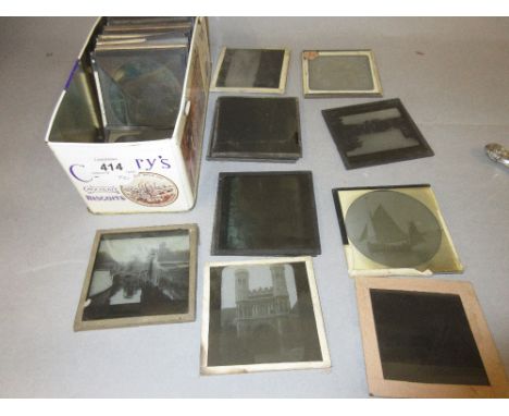 Small box containing a quantity of various glass lantern slides of varying subjects