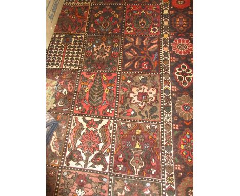 Bakhtiari garden Tile pattern carpet with floral border, approximately 9ft x 6ft   CONDITION REPORT  In good condition.No maj