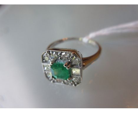 18ct White gold emerald and diamond ring