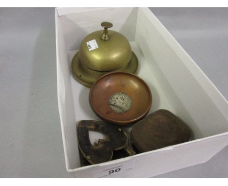 Brass counter bell, copper dish inset with an antique Austrian coin, two horse brasses and a light meter