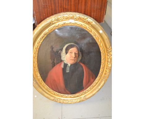 19th Century English school, oil on canvas, half length portrait of a lady wearing a lace bonnet and red shawl, in oval gilde