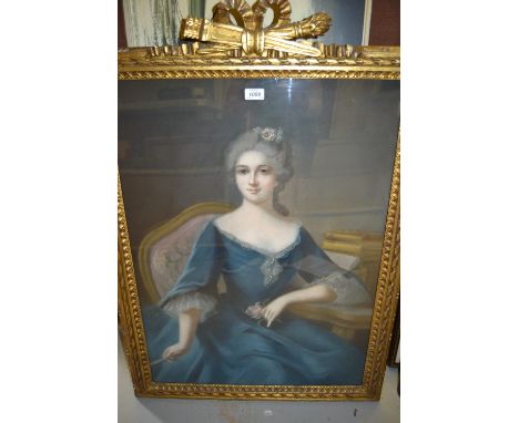 19th Century French school, pastel portrait of a seated lady wearing a blue dress, 31ins x 23ins, the gilt frame with torch a