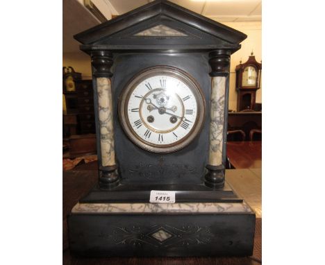19th Century French black slate marble mounted mantel clock, the enamel dial with Roman numerals and a two train visible esca