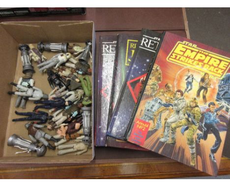 Quantity of vintage Star Wars figures together with a quantity of Star Wars annuals