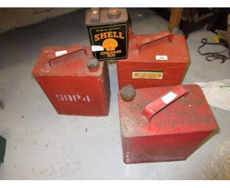 Group of four various vintage petrol cans by Shell, Pratts and others