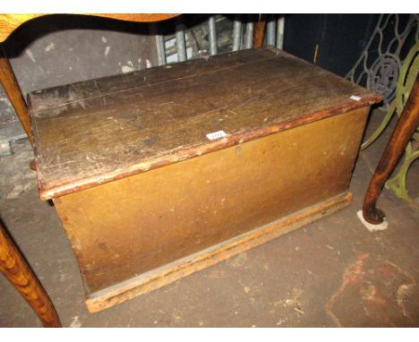 19th Century pine trunk having hinged cover and plinth base