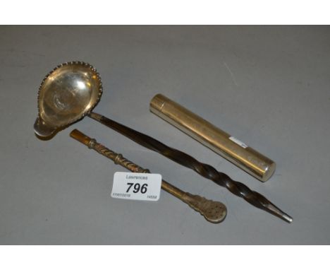 Modern Birmingham silver cigar tube, an antique white metal and coin inset toddy ladle with whale bone handle and an Argentin