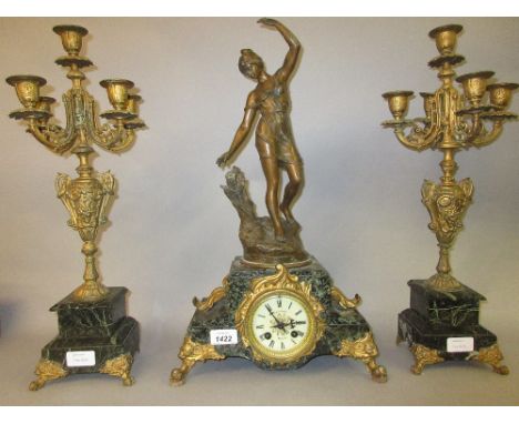 19th Century French patinated spelter and green flecked marble clock garniture, the clock surmounted by a figure of Flore, th