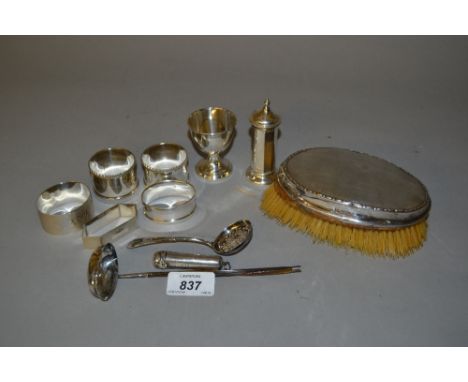 Various silver napkin rings, toddy ladle, hairbrush and other small items of silver etc.