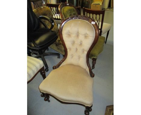 Victorian walnut and button upholstered low seat nursing chair